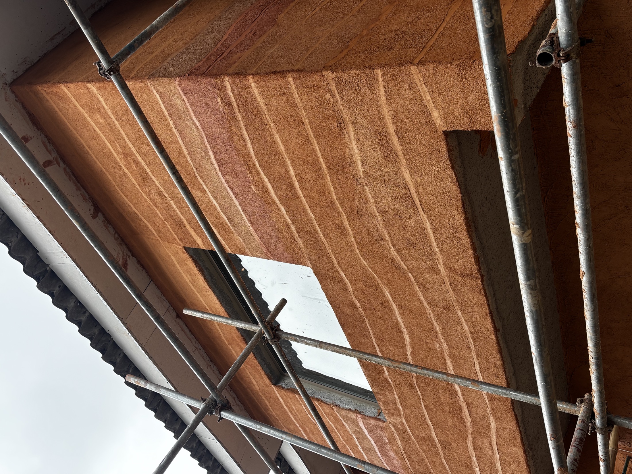 Side view of the recent lime plaster exterior project